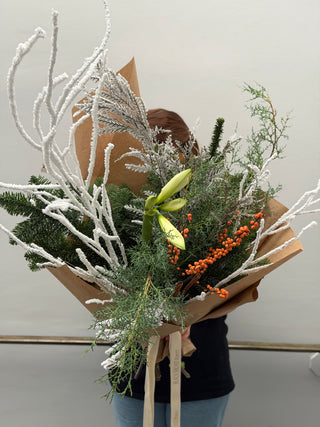 Christmas bunch with white amaryllis and ilex