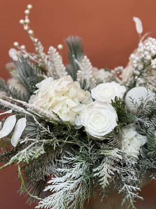 Christmas arrangement with white preserved flowers