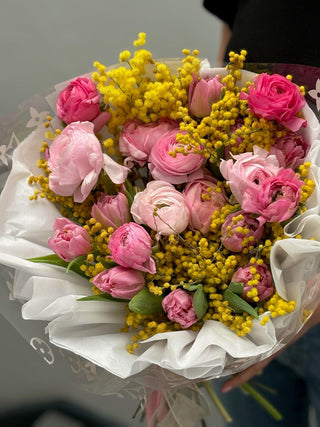 Bouquet of mimosa, tulips and ranunculus - Black Orchid Flowers