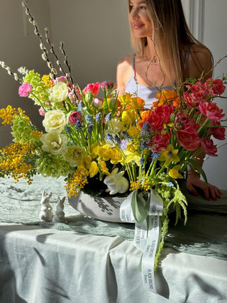 Easter centerpiece with tulips ranunculus and daffodil - Black Orchid Flowers